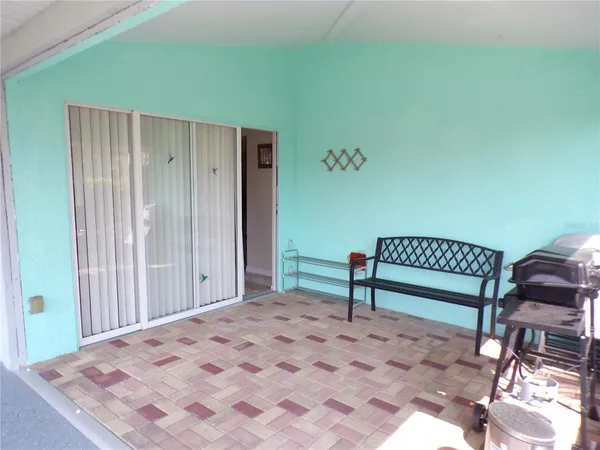 a bedroom with a bed and a table