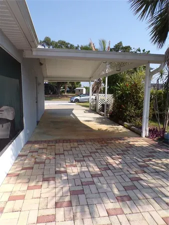 a view of a street with a building in the background