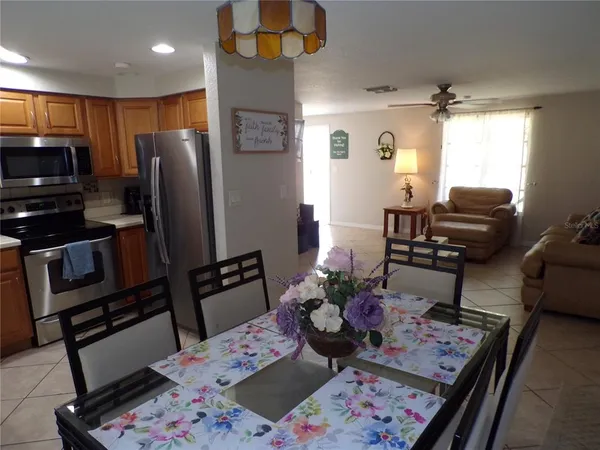 a living room with furniture fireplace and flat screen tv