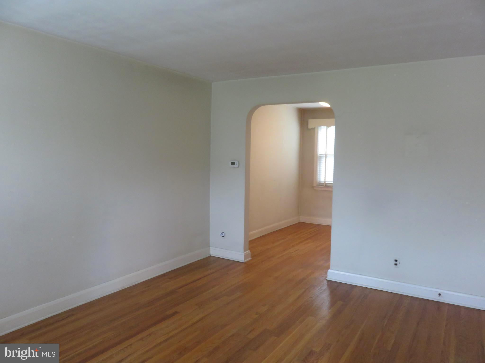 143 Hampshire Road Baltimore, MD 21221 - Photo 2 of 16 GLEAMING HARDWOOD FLOORS
