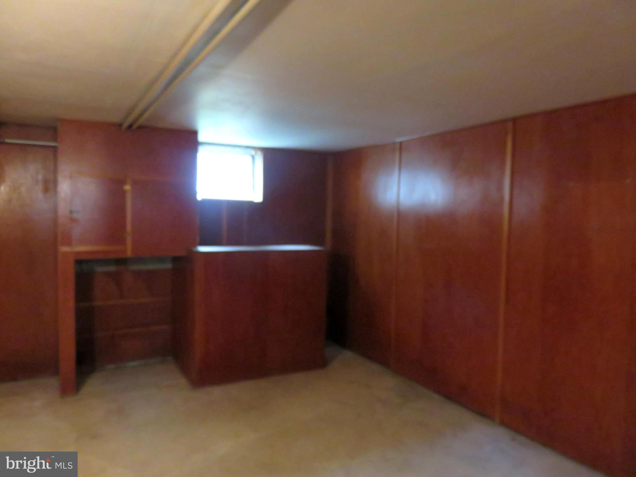 143 Hampshire Road Baltimore, MD 21221 - Photo 13 of 16 PARTIALLY FINISHED LOWER LEVEL