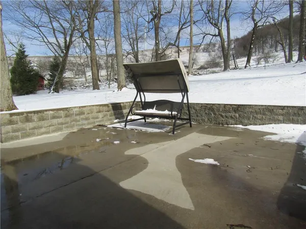 a view of a swimming pool with an outdoor space
