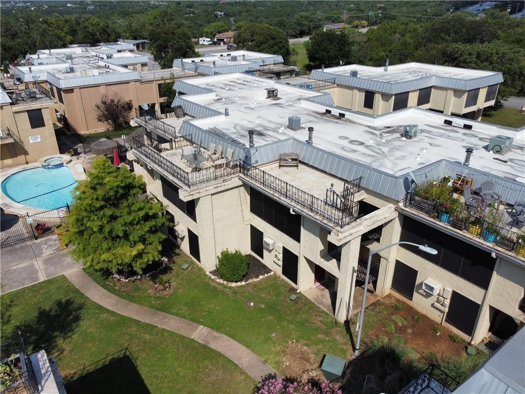 5804 Circulo Drive, Unit 5E Lago Vista, TX 78645 - Photo 9 of 12 a aerial view of a house with a yard