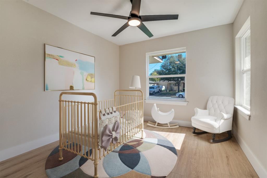 9209 Rustown Drive Dallas, TX 75228 - Photo 21 of 28 a living room with furniture and a window