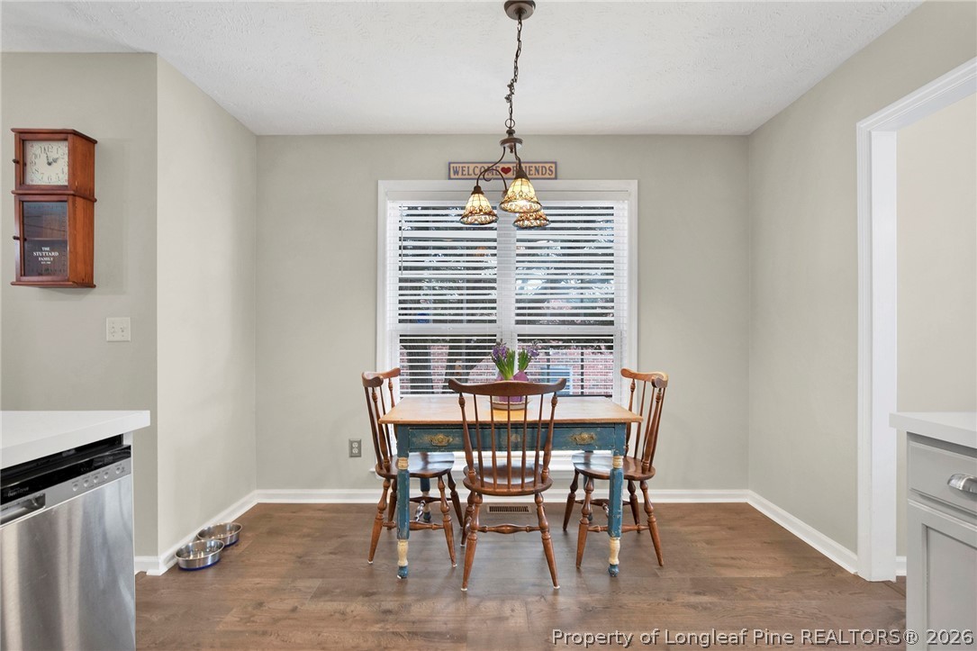 4425 Bishamon Street Hope Mills, NC 28348 - Photo 17 of 39 a dining room with furniture and window