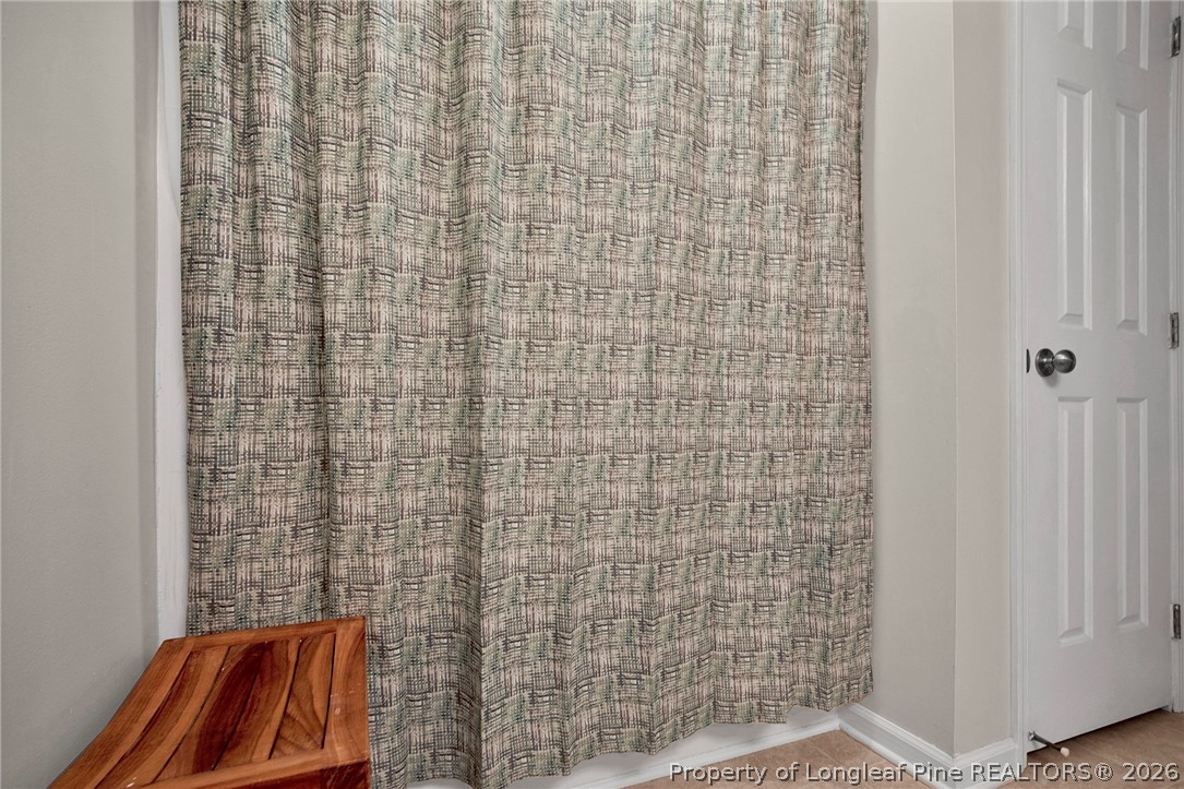 4425 Bishamon Street Hope Mills, NC 28348 - Photo 21 of 39 a bathroom with a shower