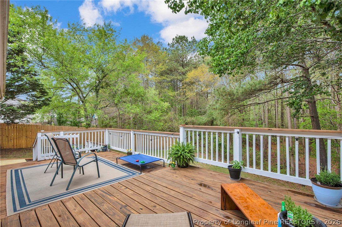4425 Bishamon Street Hope Mills, NC 28348 - Photo 28 of 39 a view of a chairs and table on the wooden floor