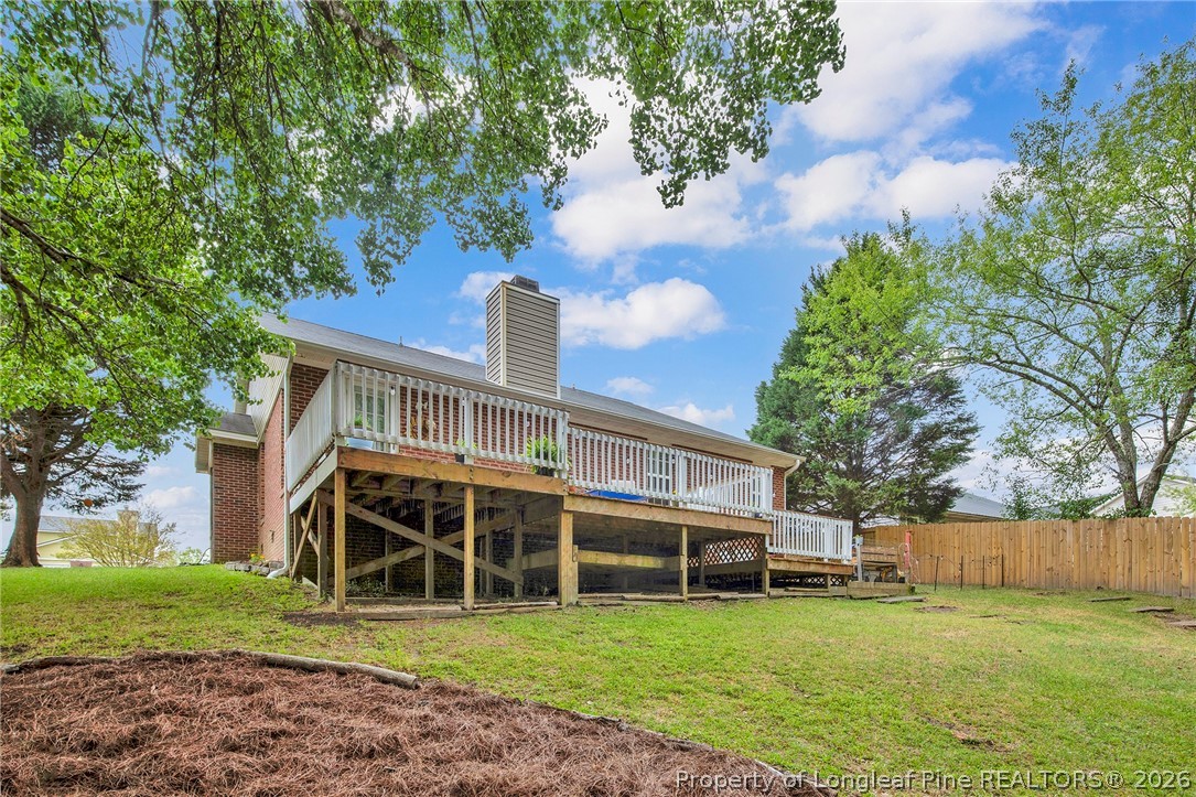 4425 Bishamon Street Hope Mills, NC 28348 - Photo 33 of 39 a view of a house with a yard
