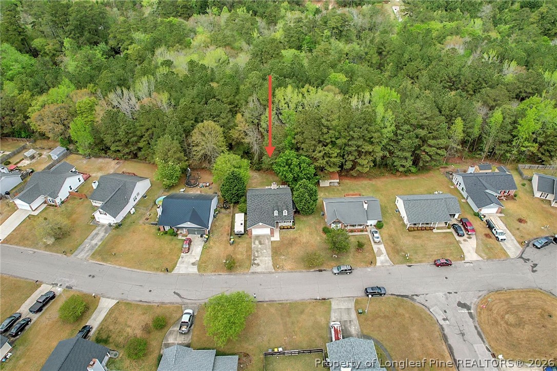 4425 Bishamon Street Hope Mills, NC 28348 - Photo 38 of 39 an aerial view of residential houses with outdoor space