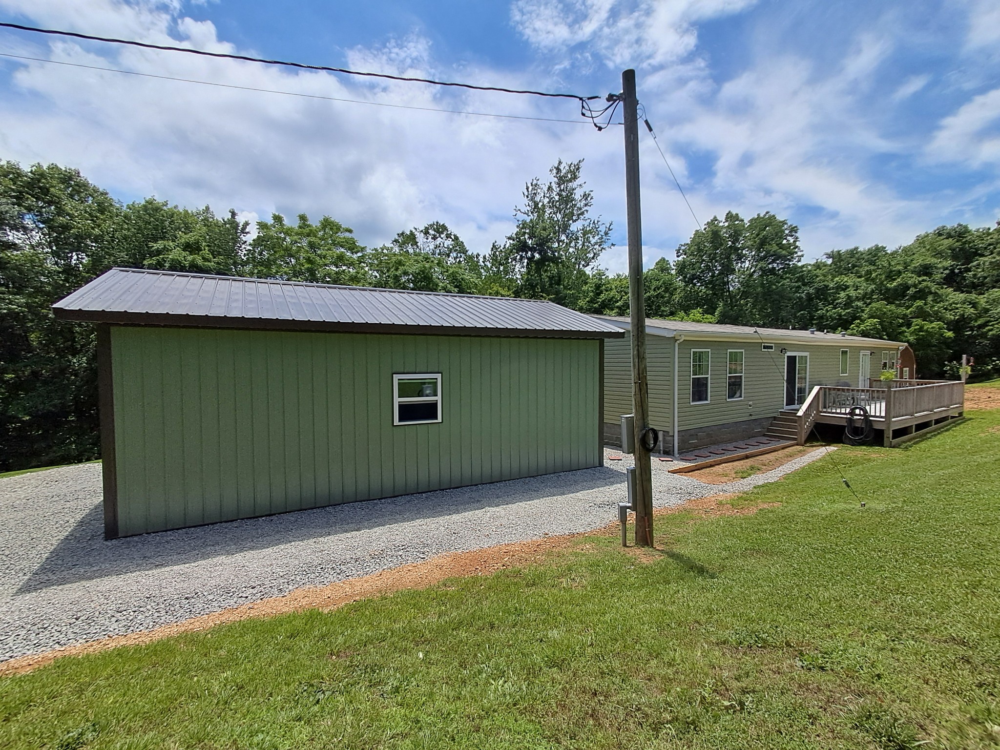 5525 Wiley Hollow Road Culleoka, TN 38451 - Photo 11 of 64 a view of a house with a backyard and a street