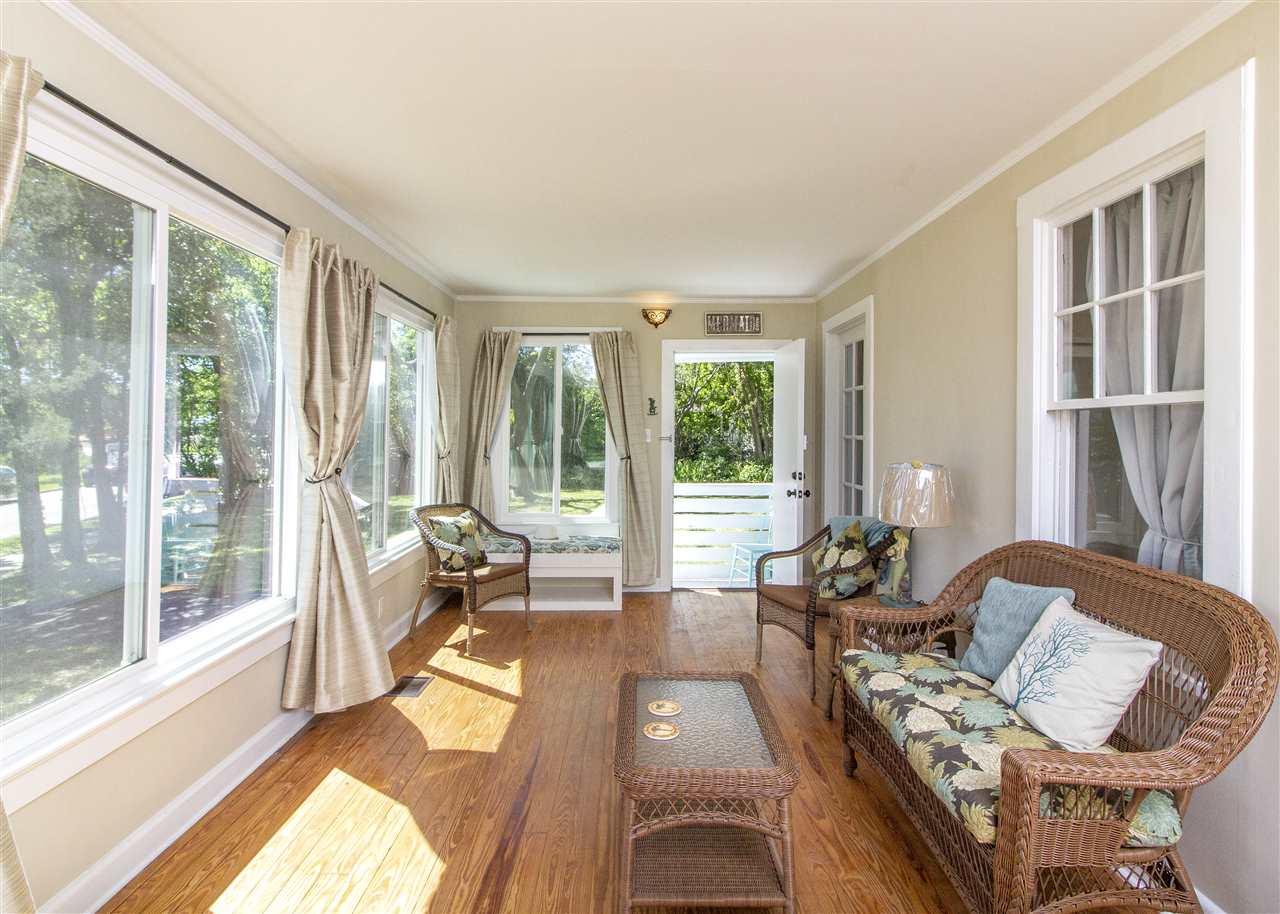 26 Rio Vista Drive St. Augustine, FL 32084 - Photo 17 of 91 a living room with furniture and floor to ceiling windows