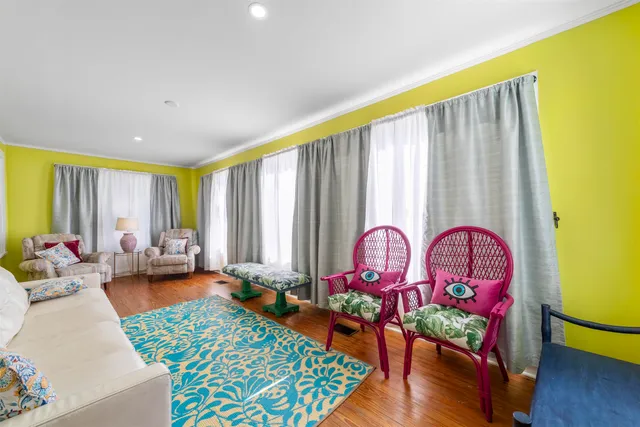 a view of a room that has a bed and a closet