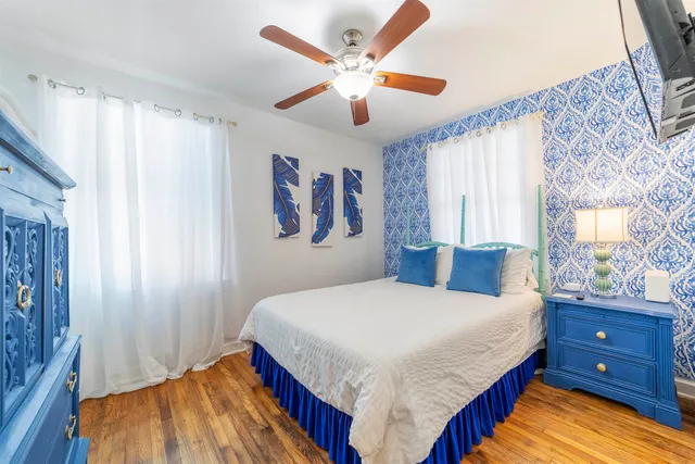 a kitchen with a refrigerator and a sink