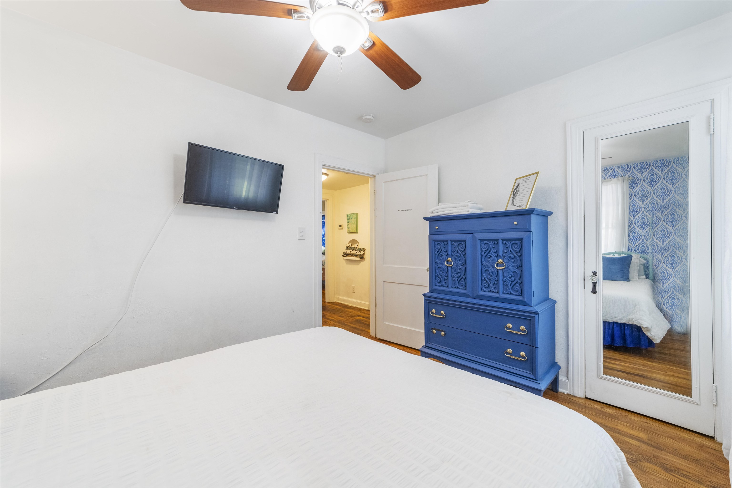 26 Rio Vista Drive St. Augustine, FL 32084 - Photo 30 of 91 a bedroom with a bed and a flat tv screen on dresser