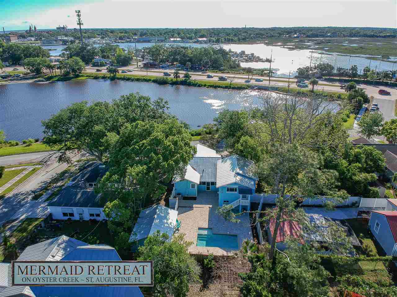 26 Rio Vista Drive St. Augustine, FL 32084 - Photo 3 of 91 an aerial view of residential houses with outdoor space and lake view