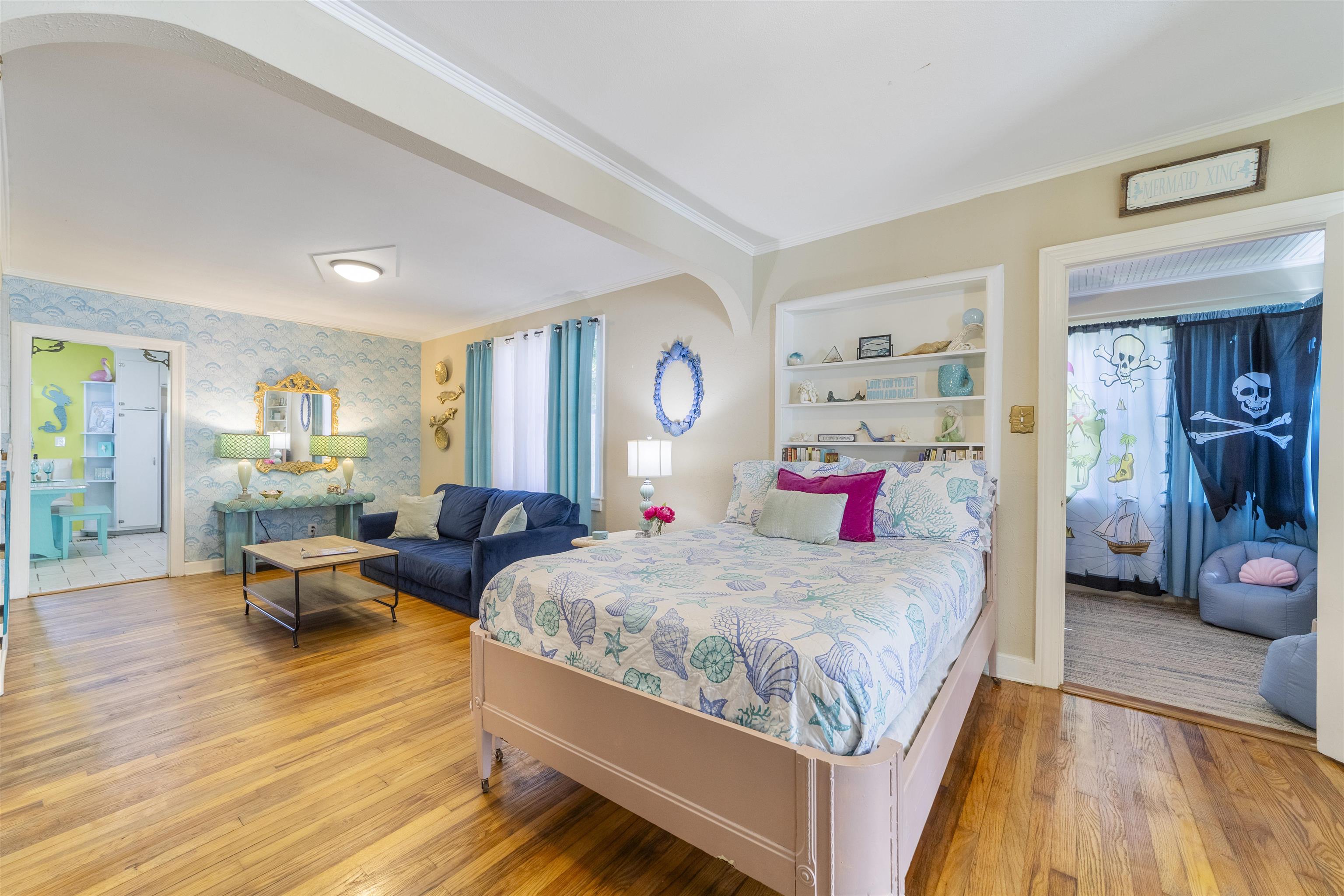 26 Rio Vista Drive St. Augustine, FL 32084 - Photo 34 of 91 a bedroom with a large bed and a couch