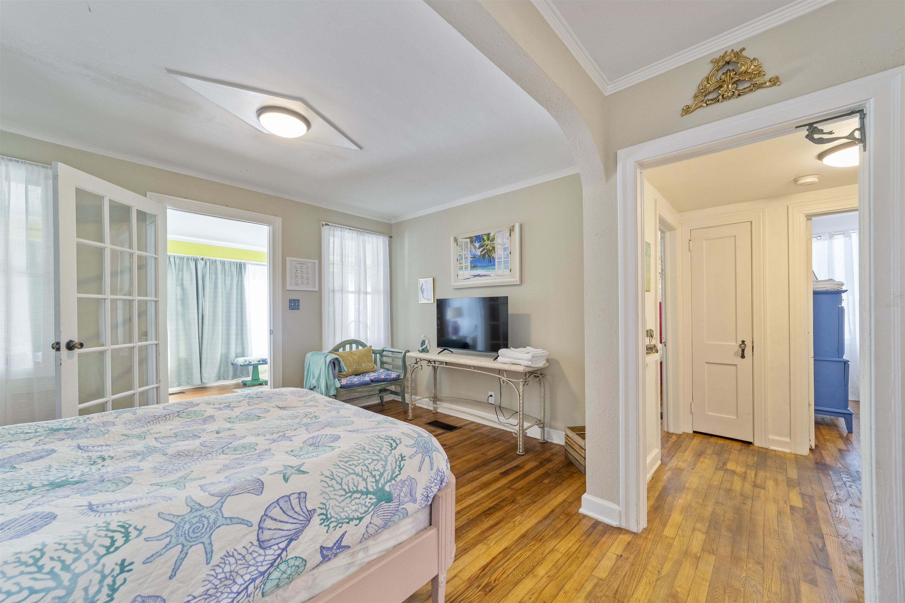 26 Rio Vista Drive St. Augustine, FL 32084 - Photo 36 of 91 a bedroom with a bed and wooden floor