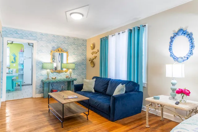 a view of house with a yard