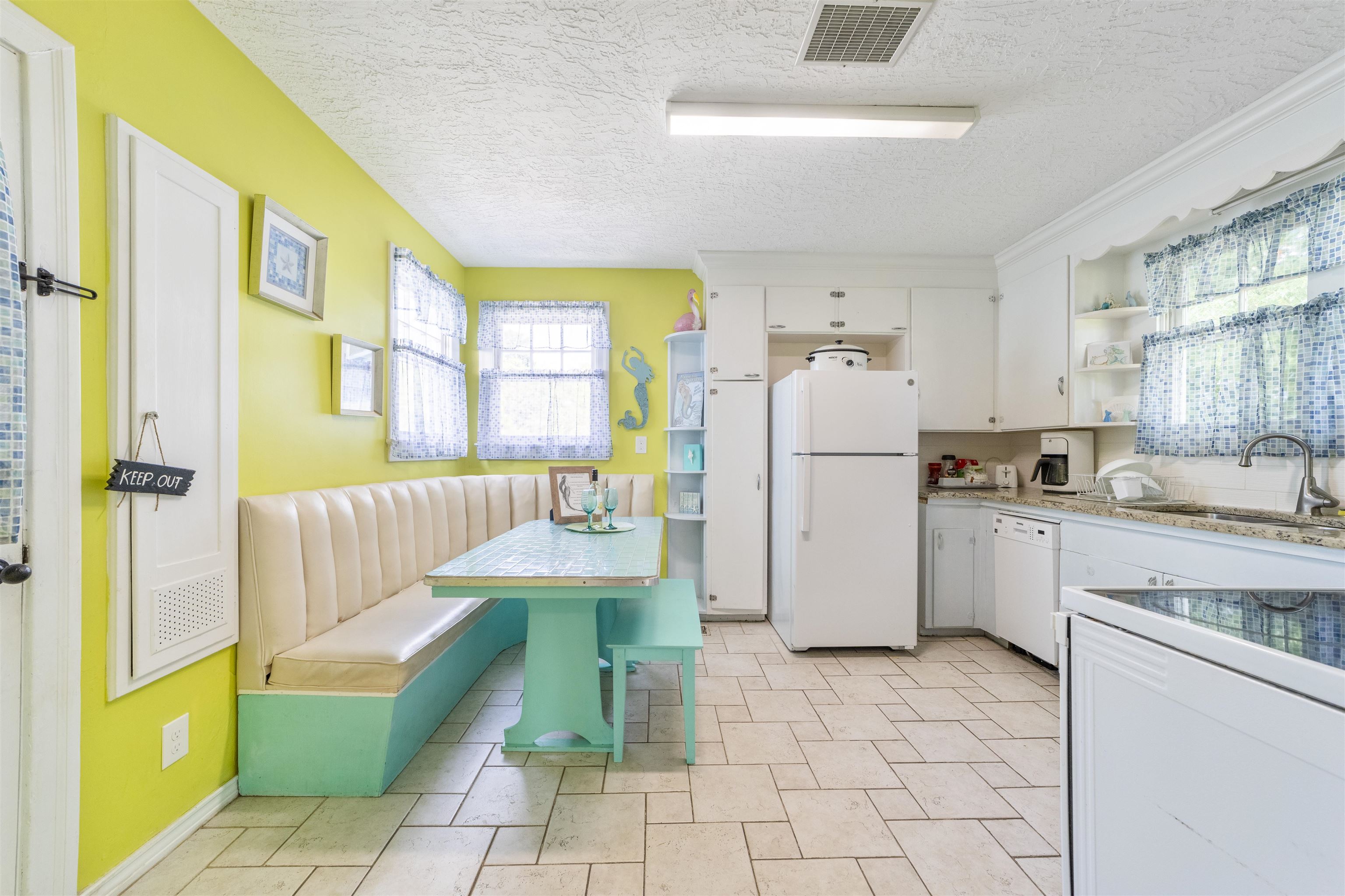 26 Rio Vista Drive St. Augustine, FL 32084 - Photo 44 of 91 a kitchen with a refrigerator and a sink