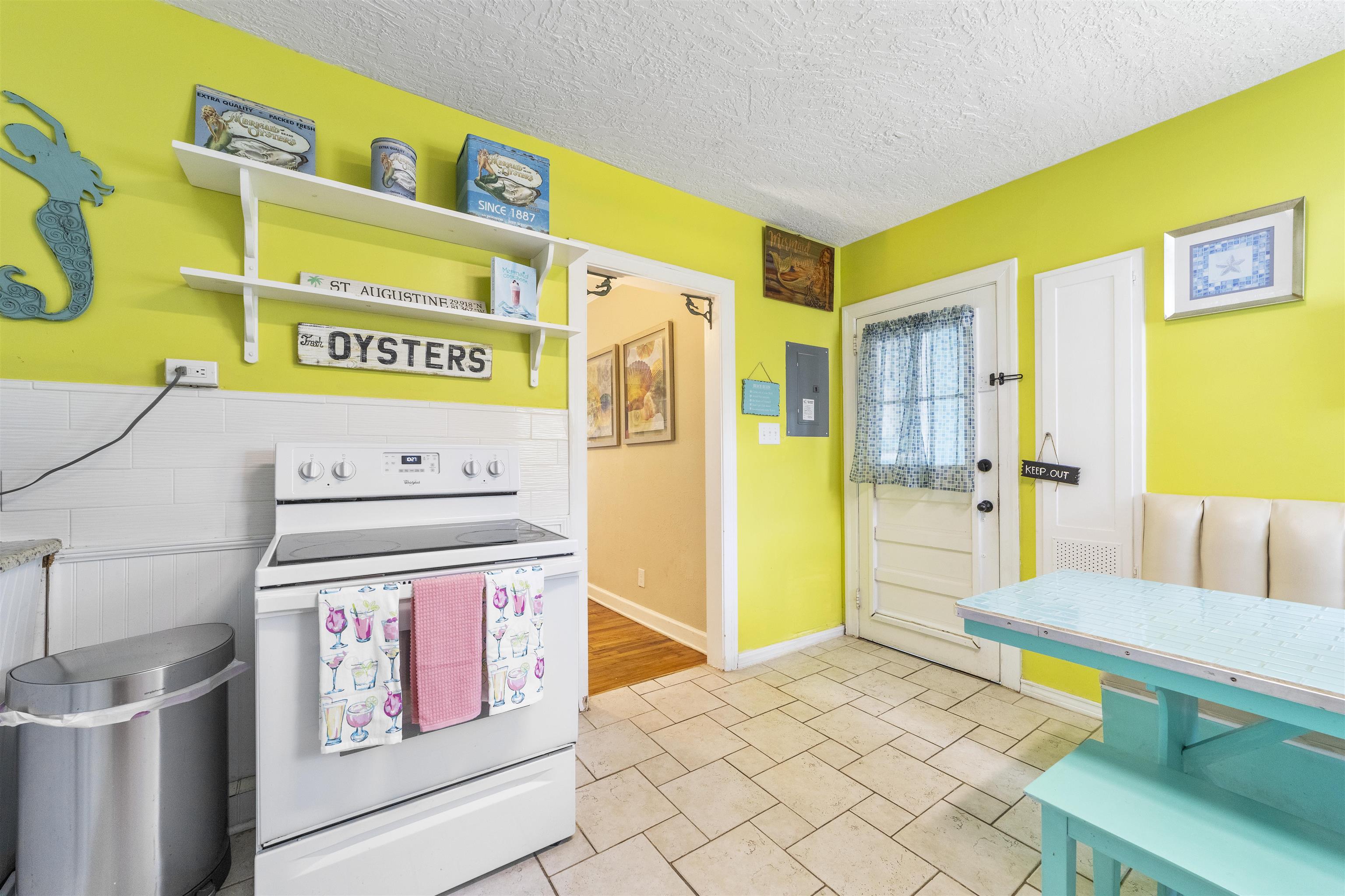 26 Rio Vista Drive St. Augustine, FL 32084 - Photo 47 of 91 a bedroom with a bed and a table in it