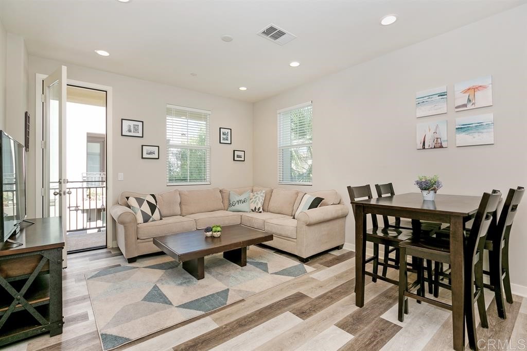 4222 Mission Ranch Way Oceanside, CA 92057 - Photo 1 of 22 a living room with furniture and a large window