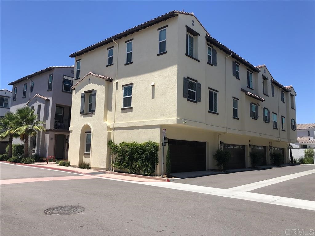 4222 Mission Ranch Way Oceanside, CA 92057 - Photo 19 of 22 a front view of a house with a yard