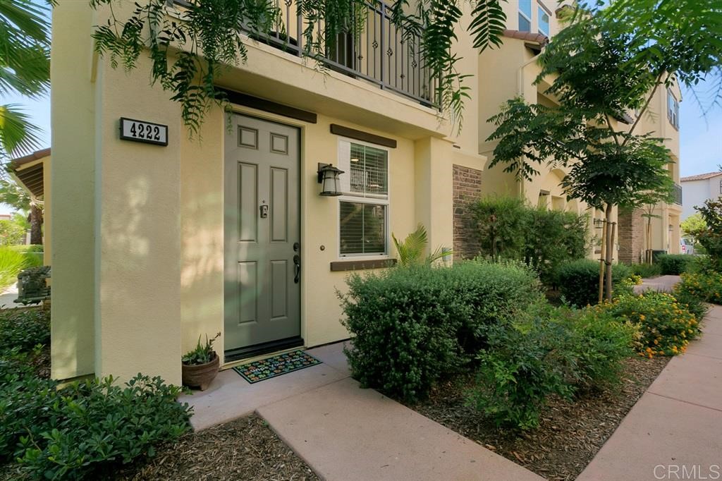 4222 Mission Ranch Way Oceanside, CA 92057 - Photo 3 of 22 a front view of a house with a yard