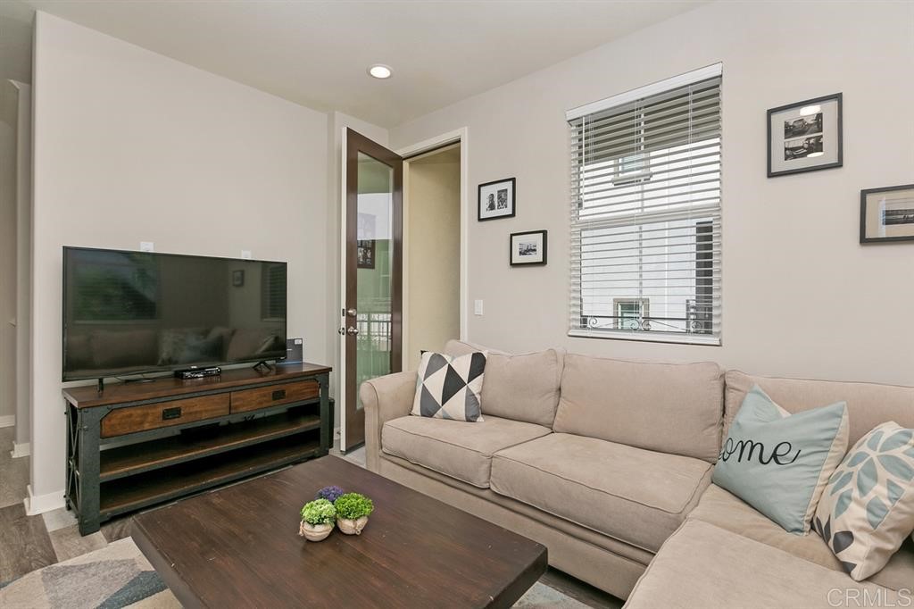 4222 Mission Ranch Way Oceanside, CA 92057 - Photo 6 of 22 a living room with furniture and a flat screen tv