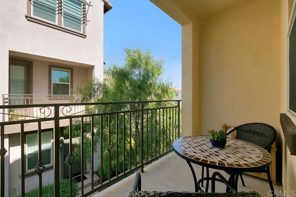 4222 Mission Ranch Way Oceanside, CA 92057 - Photo 7 of 22 a view of a balcony dining table and chairs