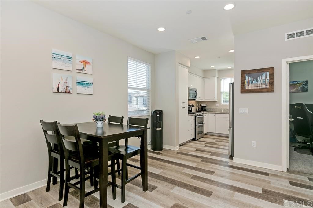 4222 Mission Ranch Way Oceanside, CA 92057 - Photo 8 of 22 a view of a dining room with furniture