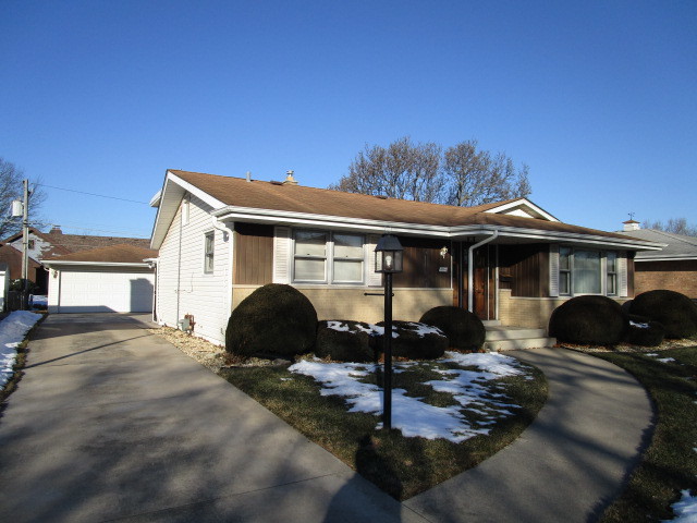 18542 Bock Road Lansing, IL 60438 - Photo 1 of 30 a front view of a house with a yard