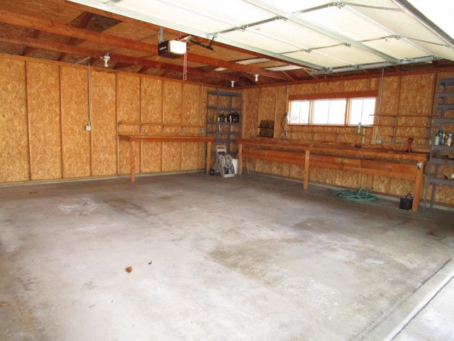 18542 Bock Road Lansing, IL 60438 - Photo 26 of 30 a view of a garage with wooden walls