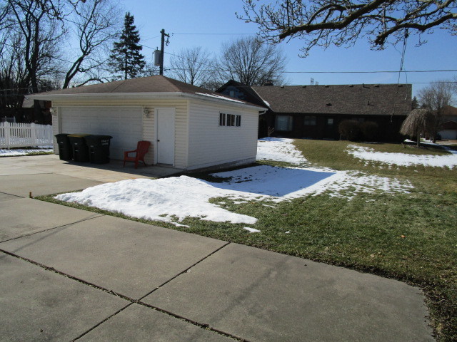 18542 Bock Road Lansing, IL 60438 - Photo 29 of 30 a front view of a house with a yard