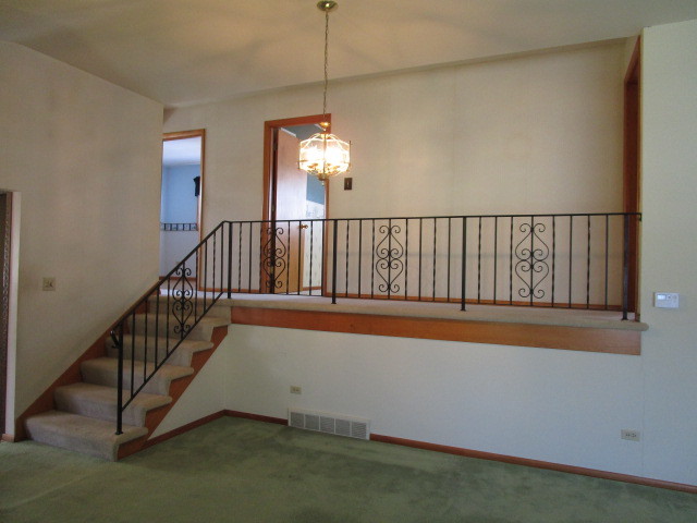 18542 Bock Road Lansing, IL 60438 - Photo 5 of 30 a view of balcony with wooden floor