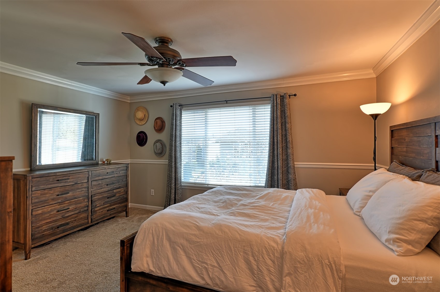 13438 Boulder Ridge Road Southeast Monroe, WA 98272 - Photo 20 of 30 a bedroom with a large bed and a window