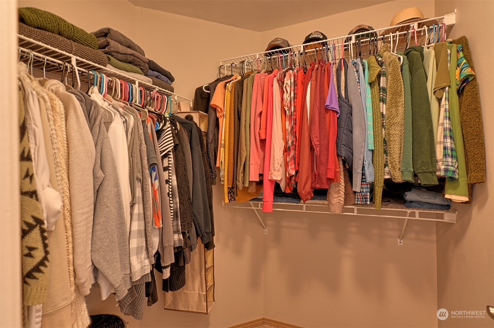 13438 Boulder Ridge Road Southeast Monroe, WA 98272 - Photo 23 of 30 a view of walk in closet with clothes