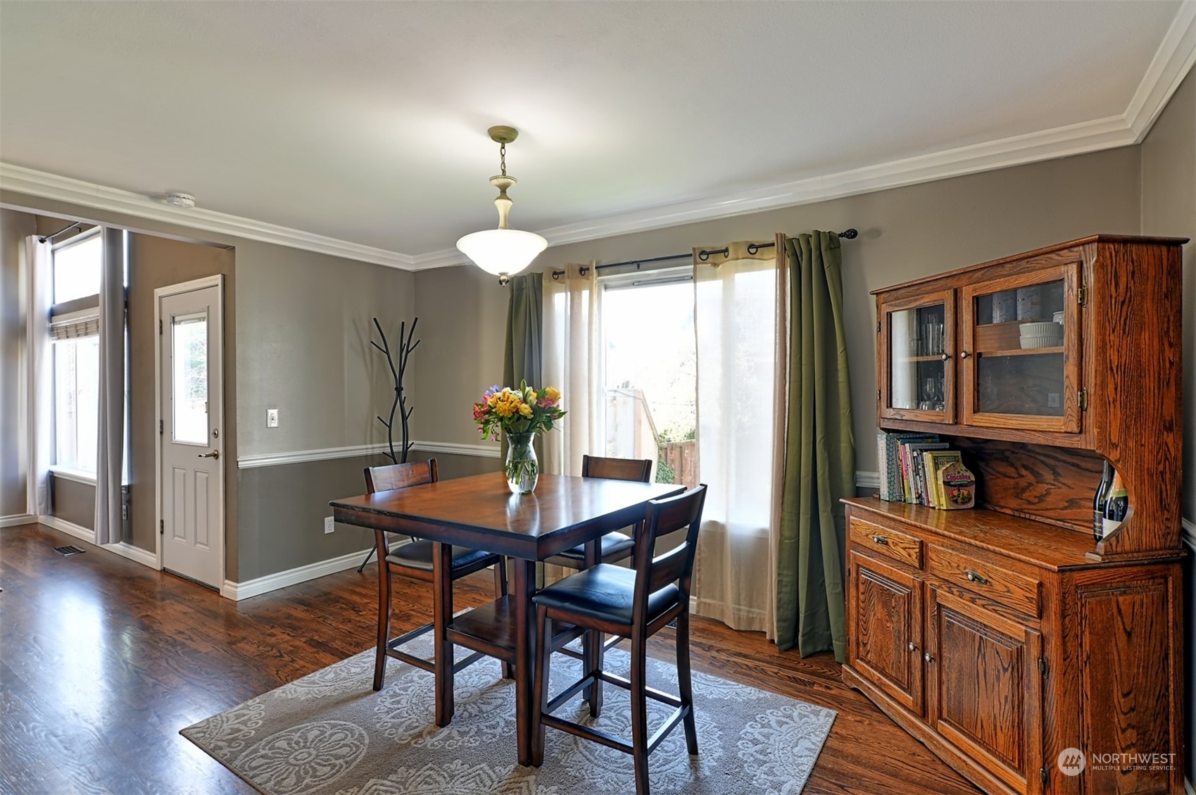 13438 Boulder Ridge Road Southeast Monroe, WA 98272 - Photo 9 of 30 a view of a dining room with furniture and window