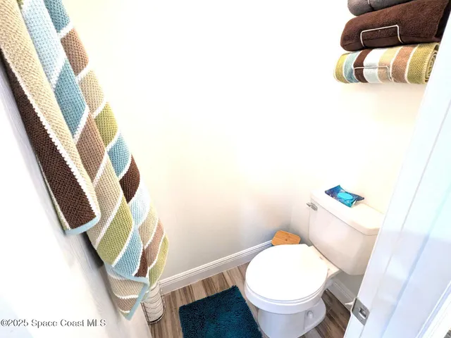 a view of a balcony with lake view and a ocean view