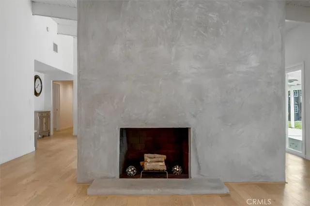 a kitchen with a sink a stove cabinets and a counter top space