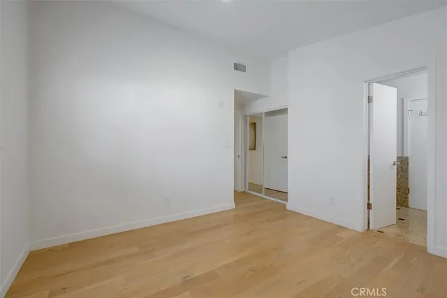 a view of a house with swimming pool and sitting area