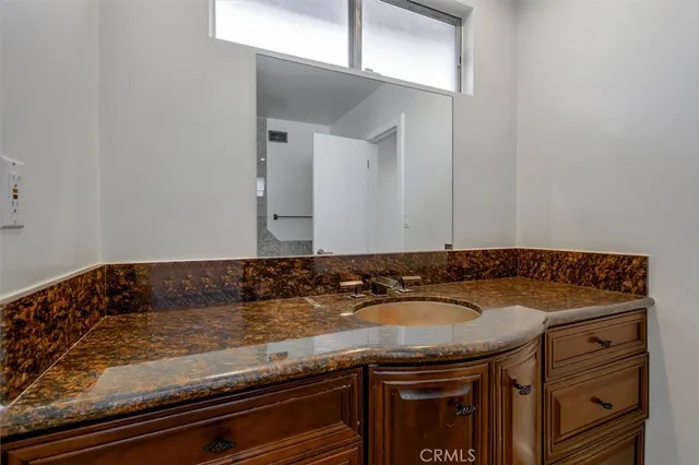 a view of a back yard of the house