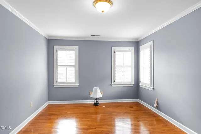 a living room with furniture fireplace and flat screen tv