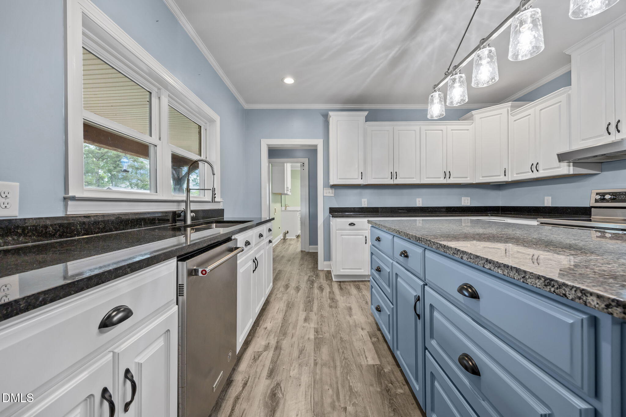 3611 Chewning Road Oxford, NC 27565 - Photo 31 of 45 a kitchen with granite countertop white cabinets and white appliances