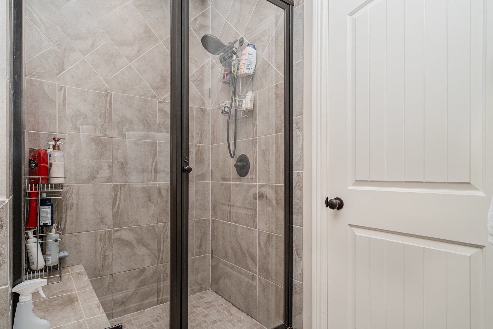 5227 Starnes Drive Murfreesboro, TN 37128 - Photo 16 of 29 a bathroom with a glass shower door