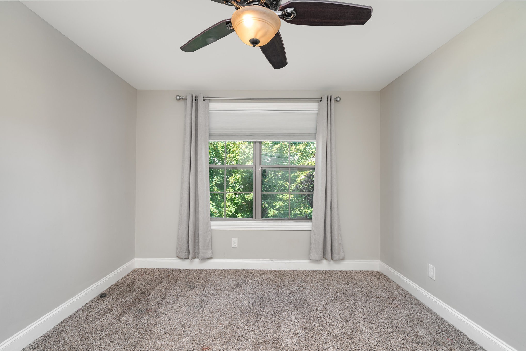 5227 Starnes Drive Murfreesboro, TN 37128 - Photo 22 of 29 a view of an empty room with chandelier fan
