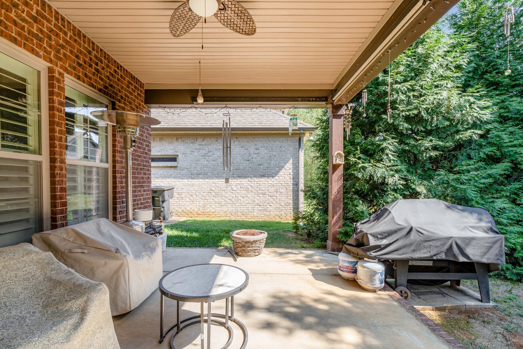 5227 Starnes Drive Murfreesboro, TN 37128 - Photo 24 of 27 a backyard of a house with a table and chairs