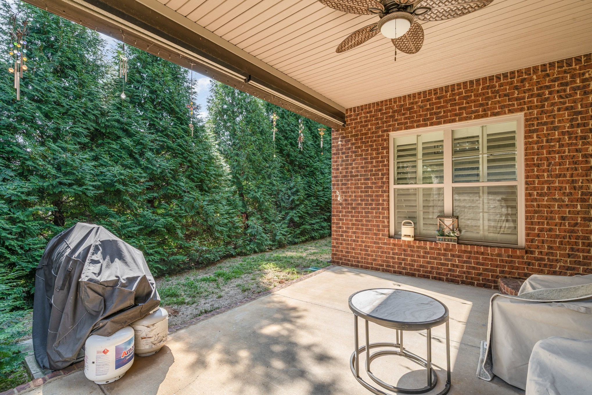 5227 Starnes Drive Murfreesboro, TN 37128 - Photo 26 of 29 a view of a porch with furniture and a backyard