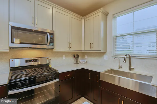 a work room with a window and a table
