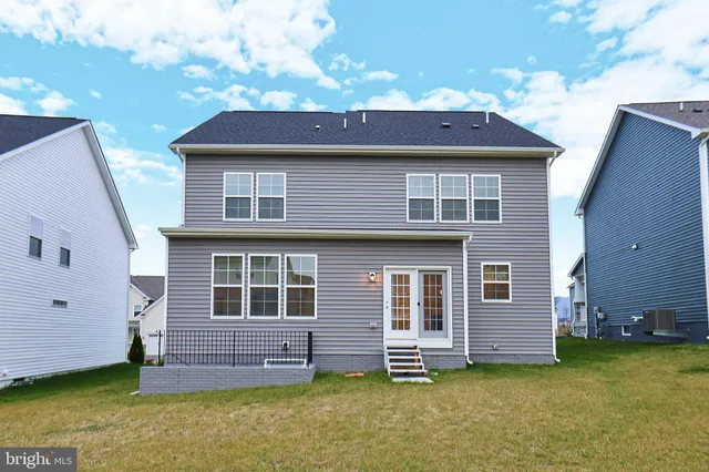 a view of a chairs and tables in the patio