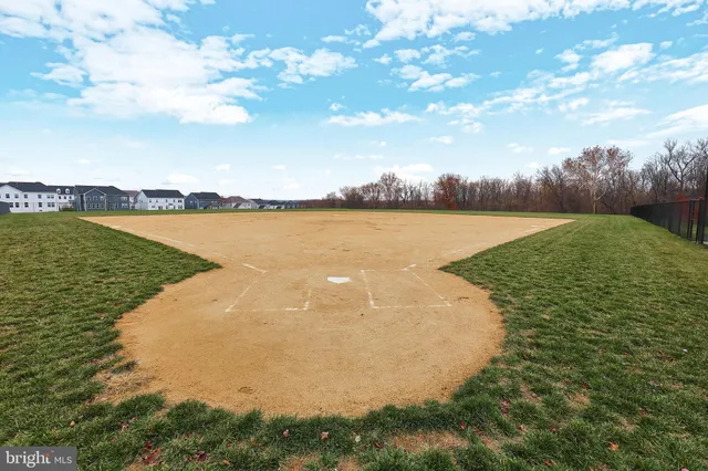 a outdoor space with lots of white furniture